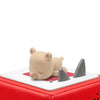Sleepy bear on a red surface with a white background