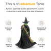Tonie character with broom and witch hat on a white background, featuring text about adventure Tonies.