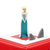 Toy figure of a princess in a blue dress on a red and white base.