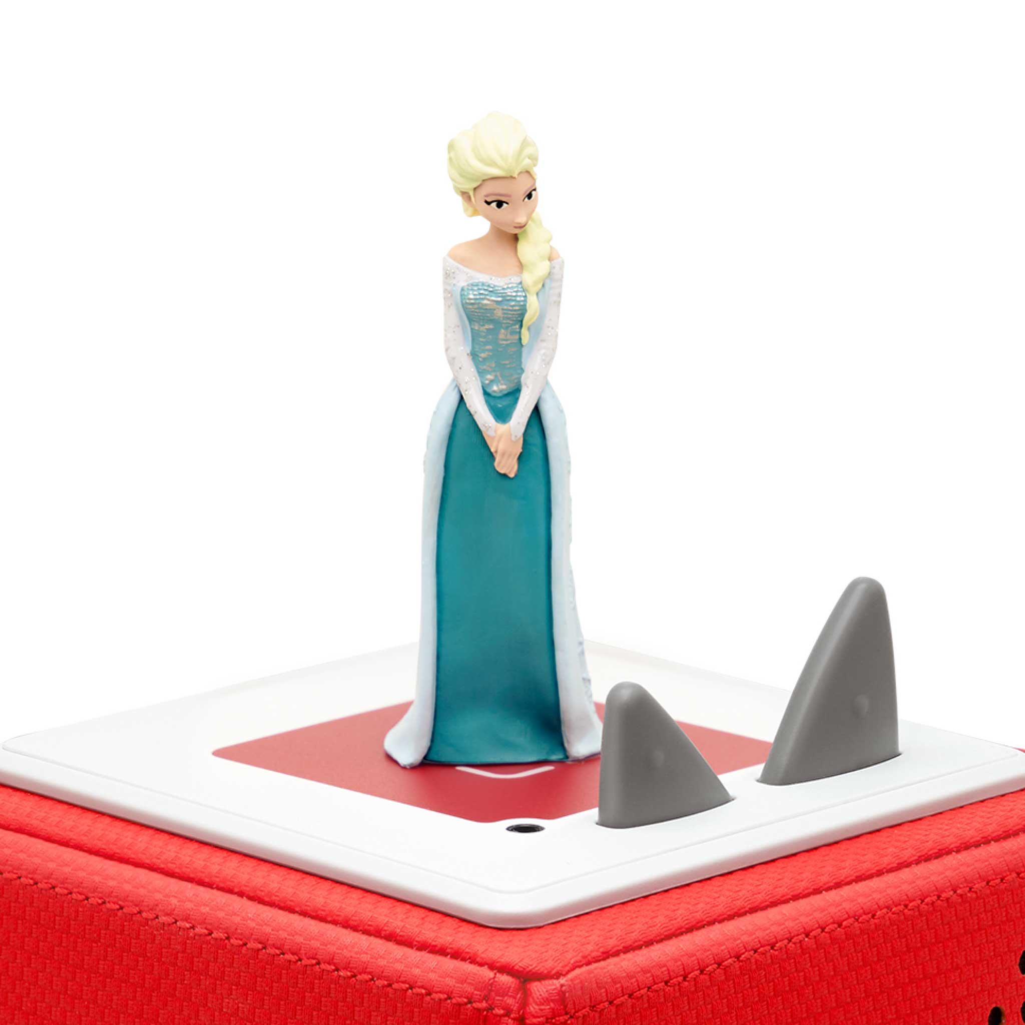 Toy figure of a princess in a blue dress on a red and white base.