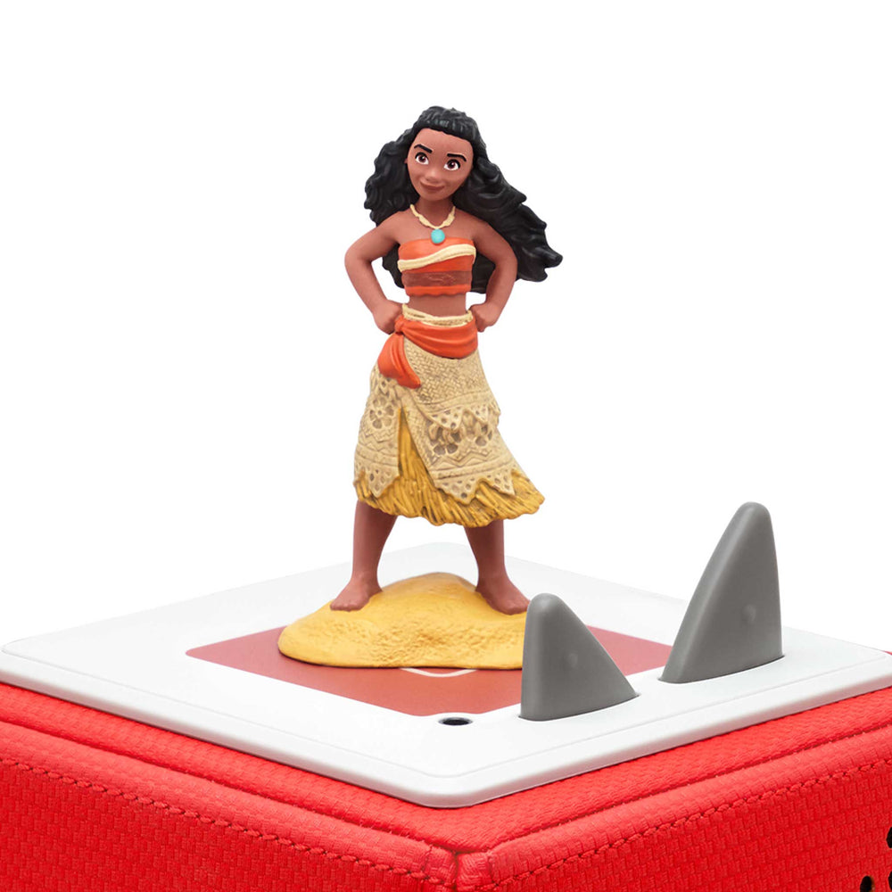 Figurine of a character from Moana on a red and white base with shark fins.