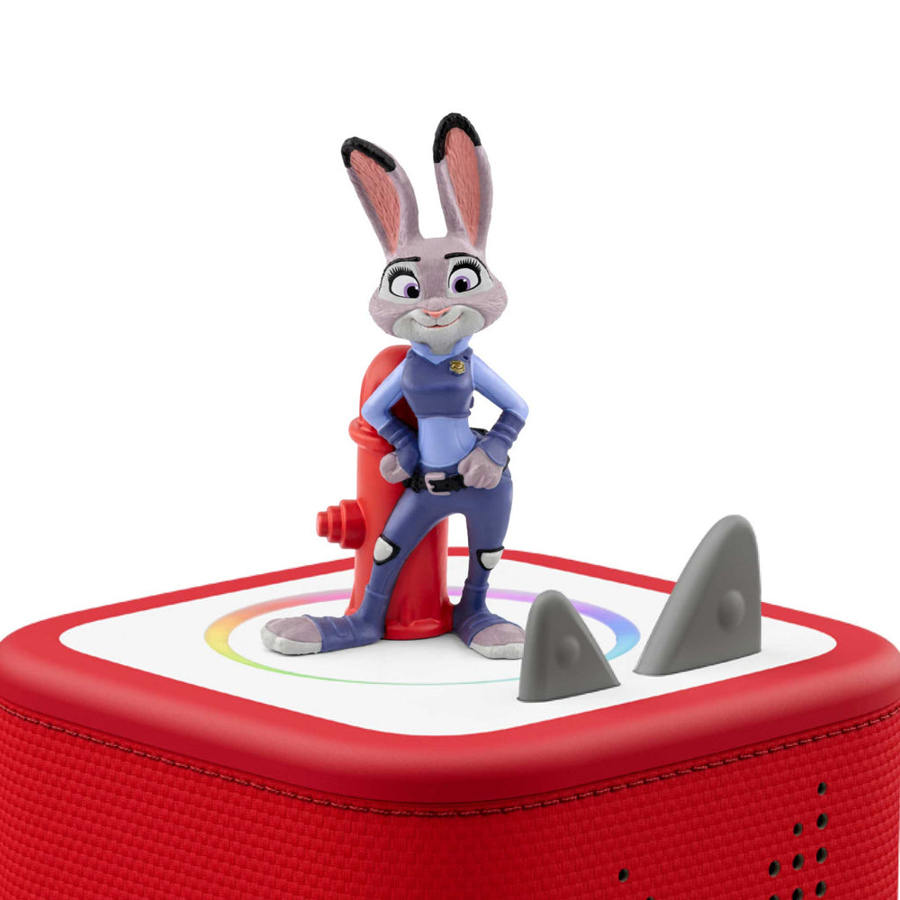 Animated character figurine on a red platform with a white background