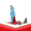 Blue character figurine on a red and white surface.