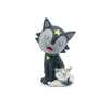 Decorative cat figurine with star accents on a white background