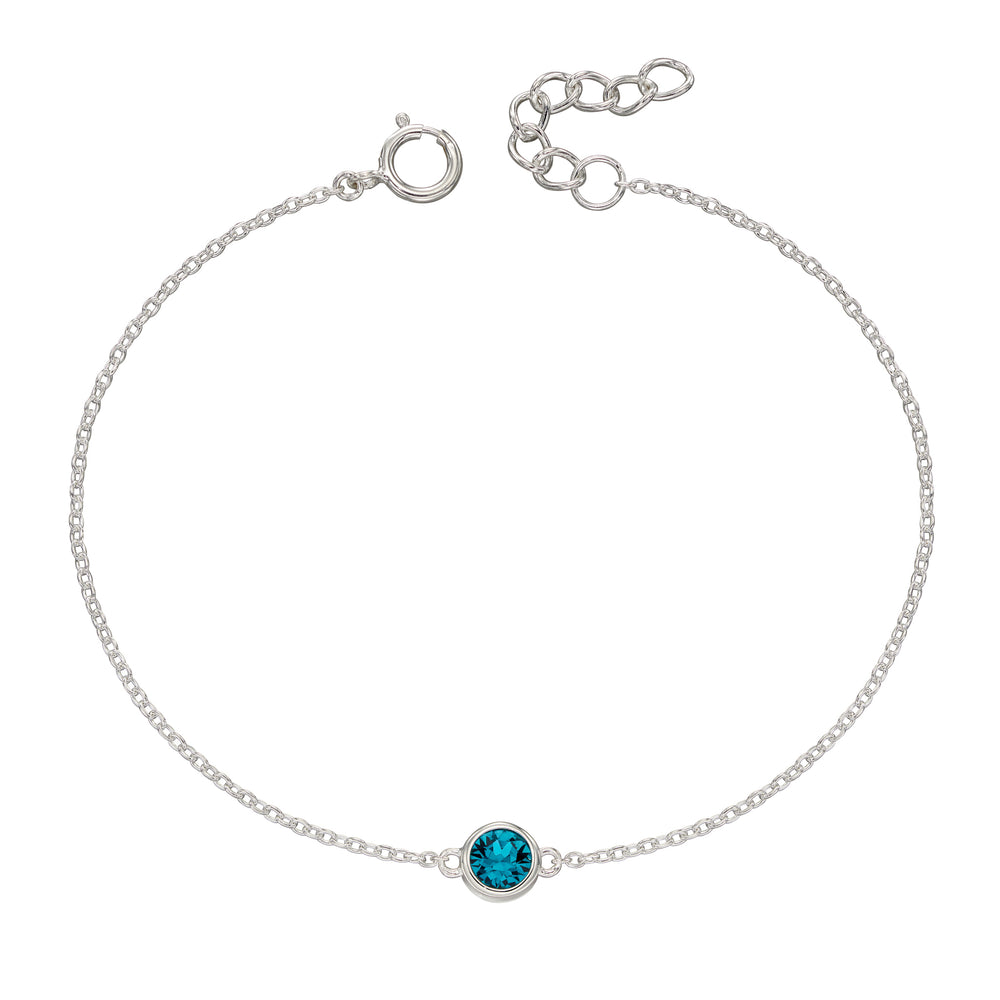 Silver bracelet with crystal birthstone for December.