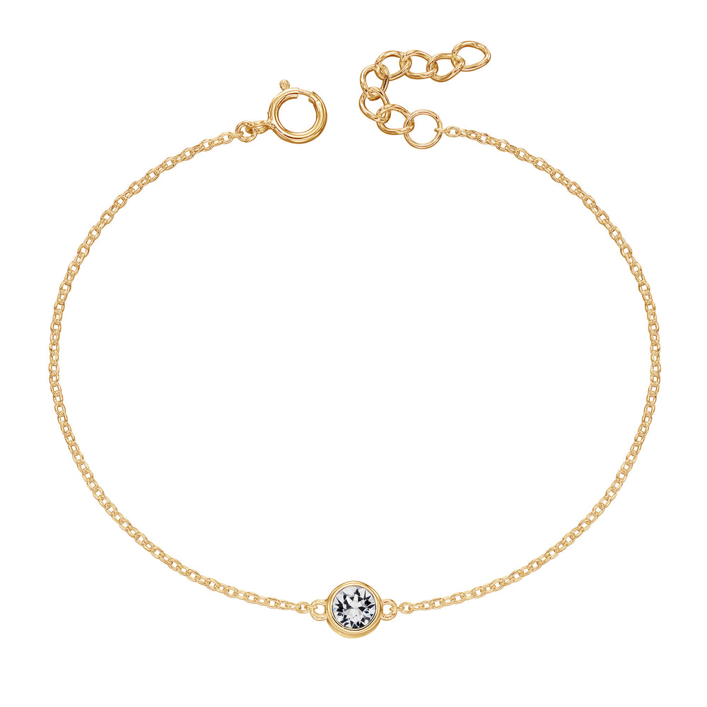 Gold bracelet with crystal birthstone for April.