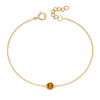 Gold bracelet with crystal birthstone for November.