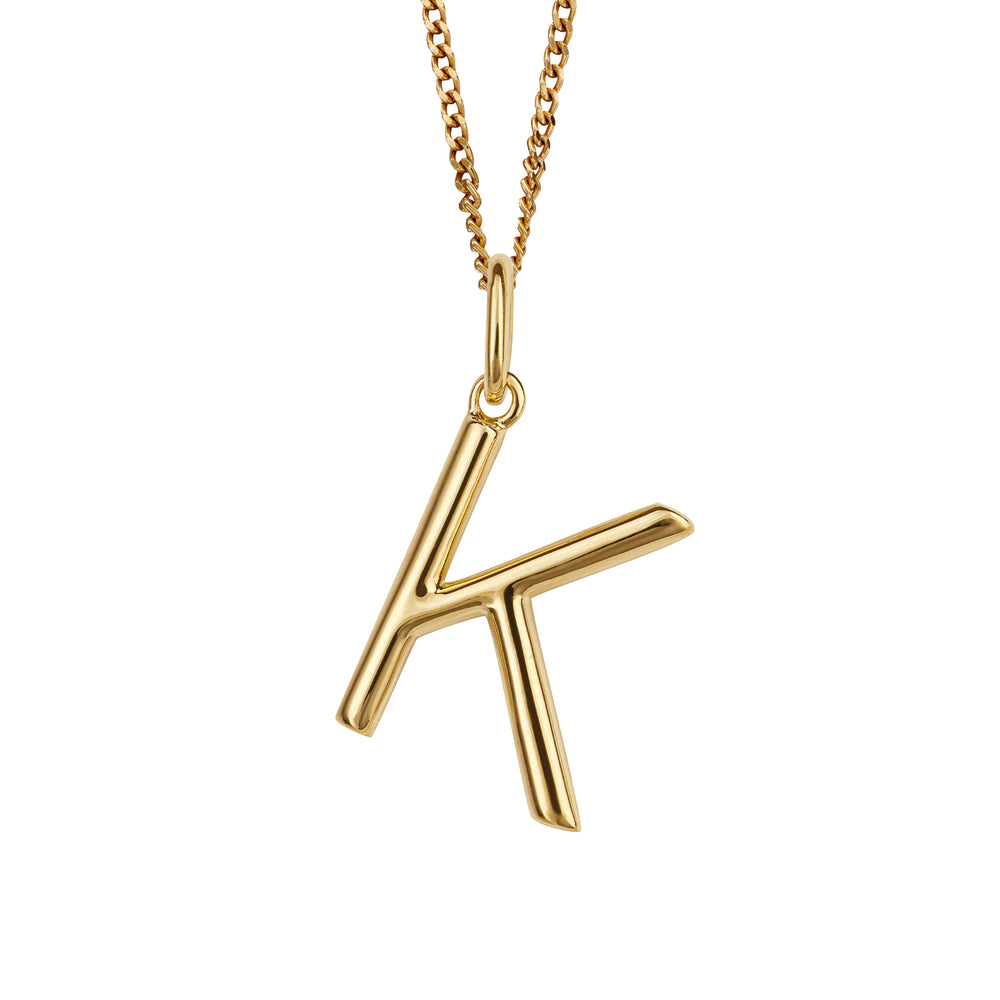 Gold chain with a gold pendant with the initial K.