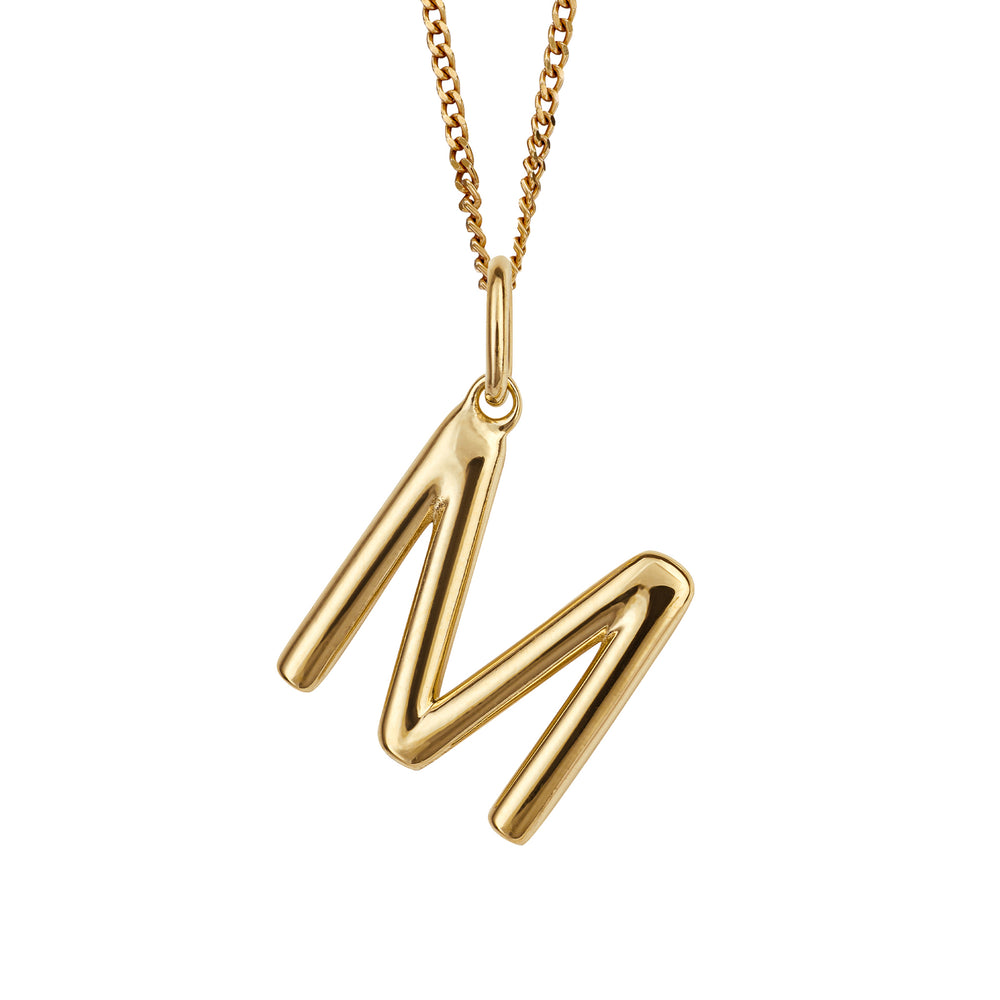 Gold chain with a gold pendant with the initial M.