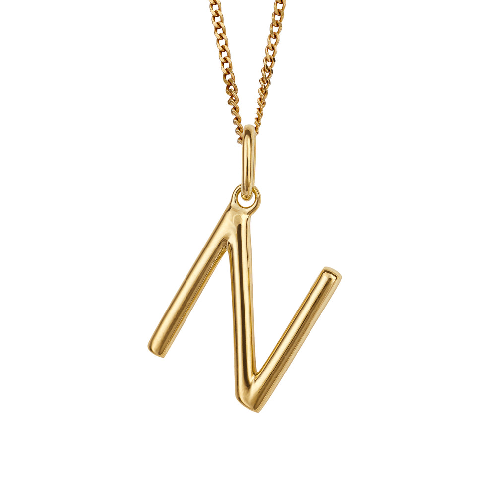Gold chain with a gold pendant with the initial N.