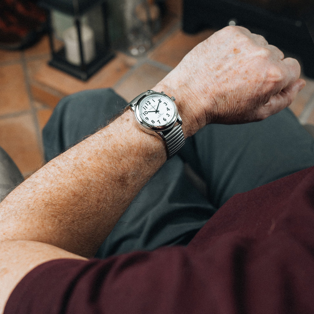 Someone wearing the watch with expanding bracelet strap