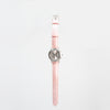 Front view of face and strap of tactile watch against a white background