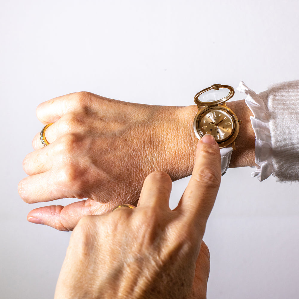 RNIB small tactile watch with white leather strap