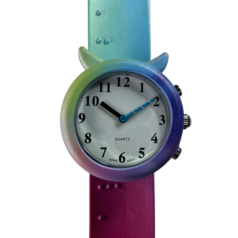 Close-up of talking children's watch face and rainbow ombre slapband strap