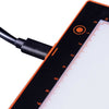 Close up view of the A4 lightboard showing a charging lead attached.