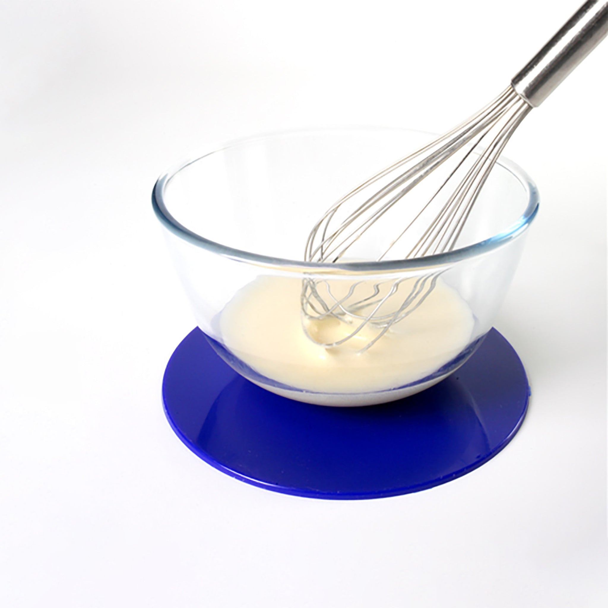 Mixing bowl on round blue dycem mat