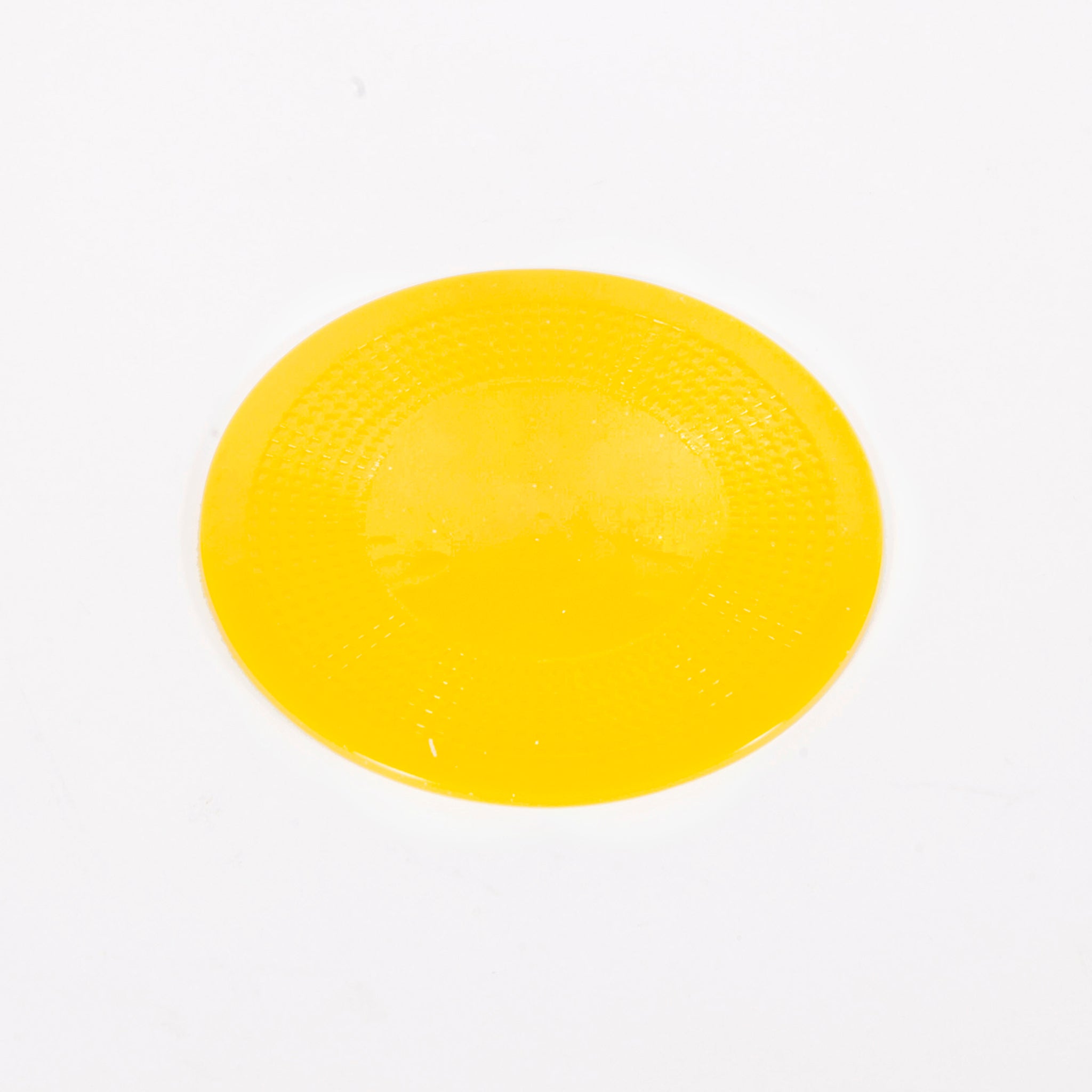 Round yellow dycem mat