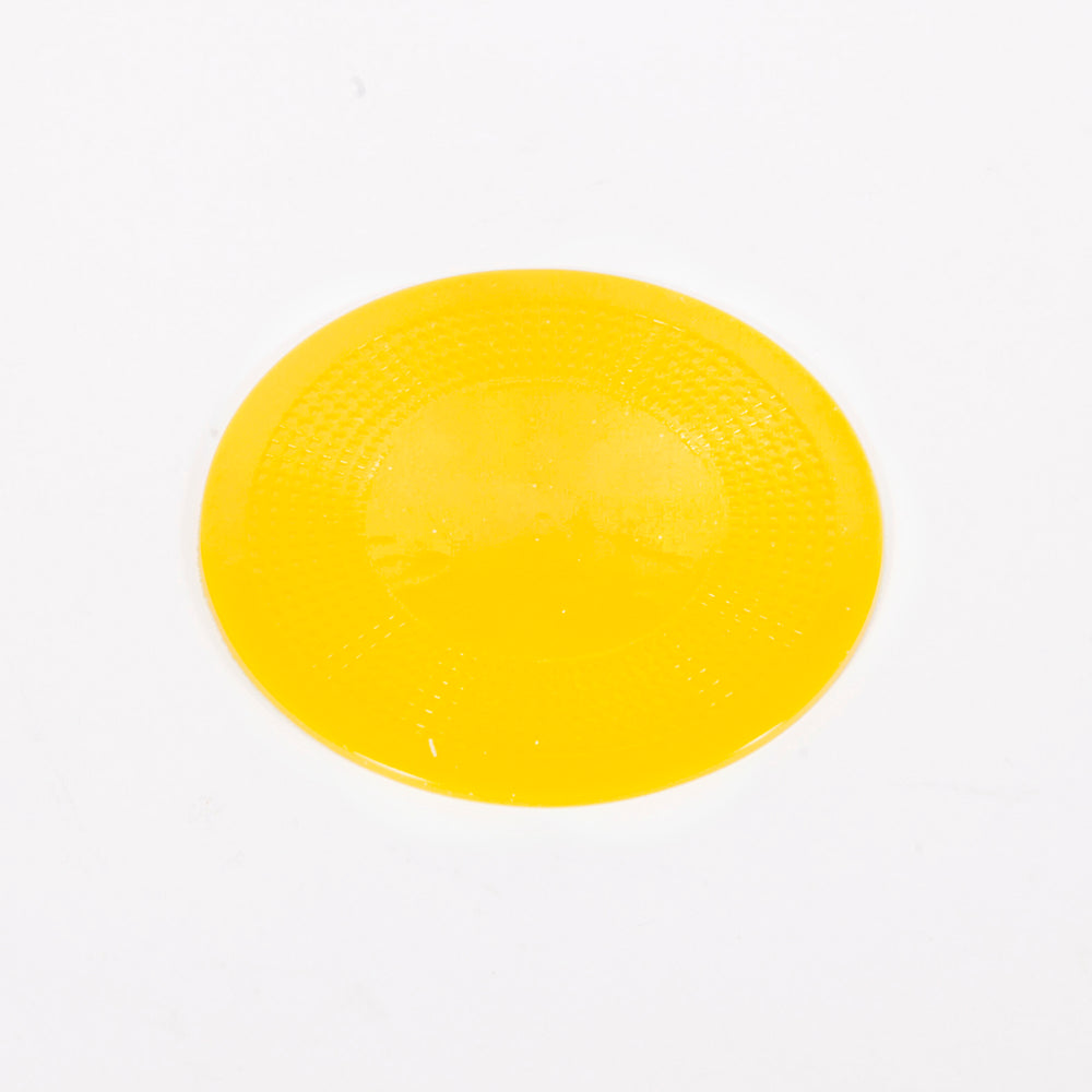 Round yellow dycem mat