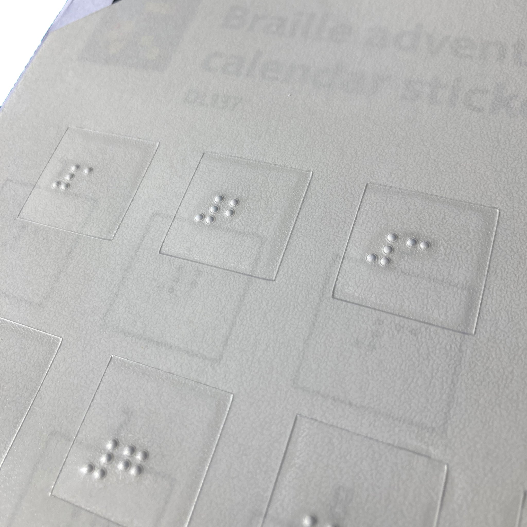 Close up of braille sticker sheet