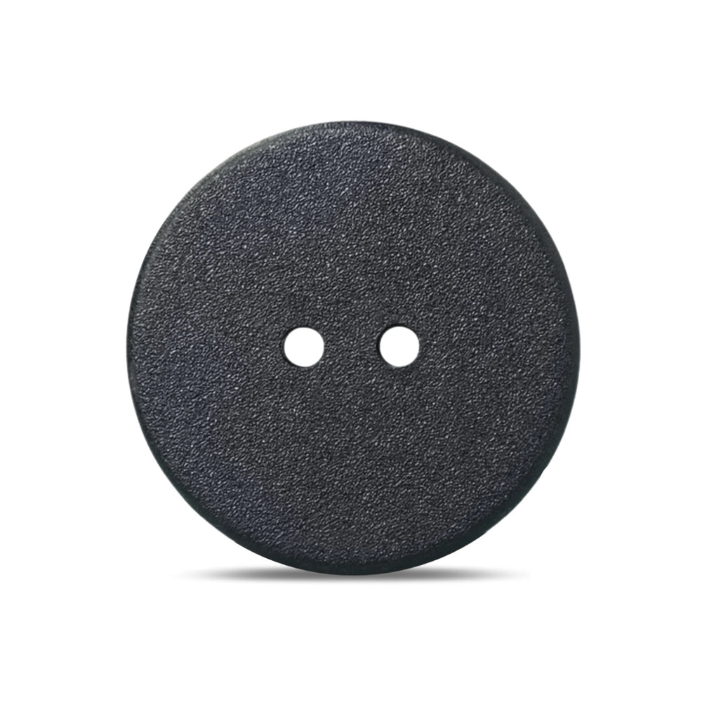 Speechlable laundry label in the shape of a round black clothing button against a white background.