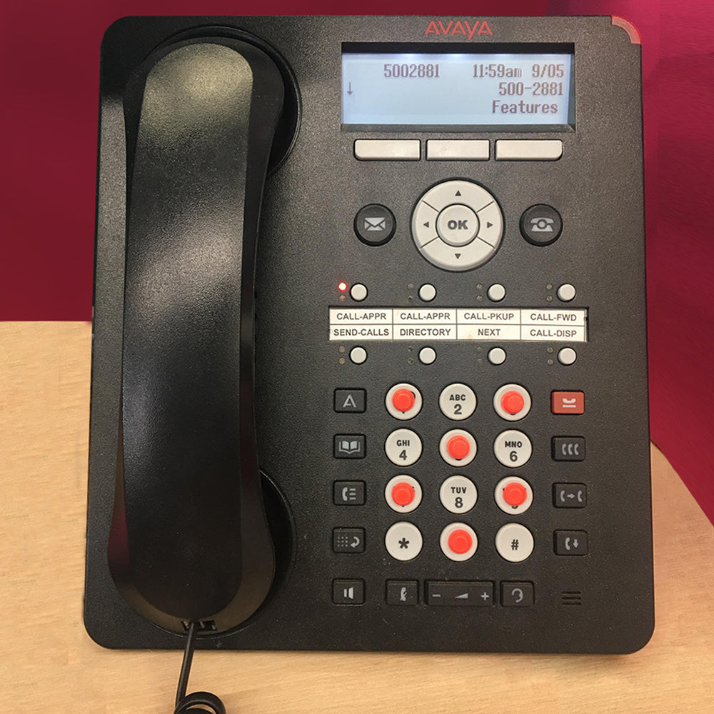 Orange bumperstops on a landline phone keypad