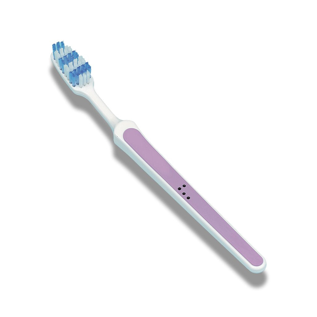 Toothbrush marked with black tacti-mark