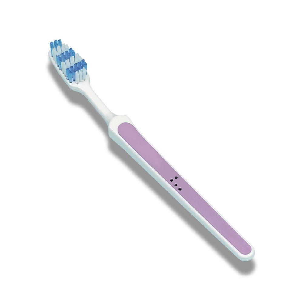 Toothbrush marked with black tacti-mark