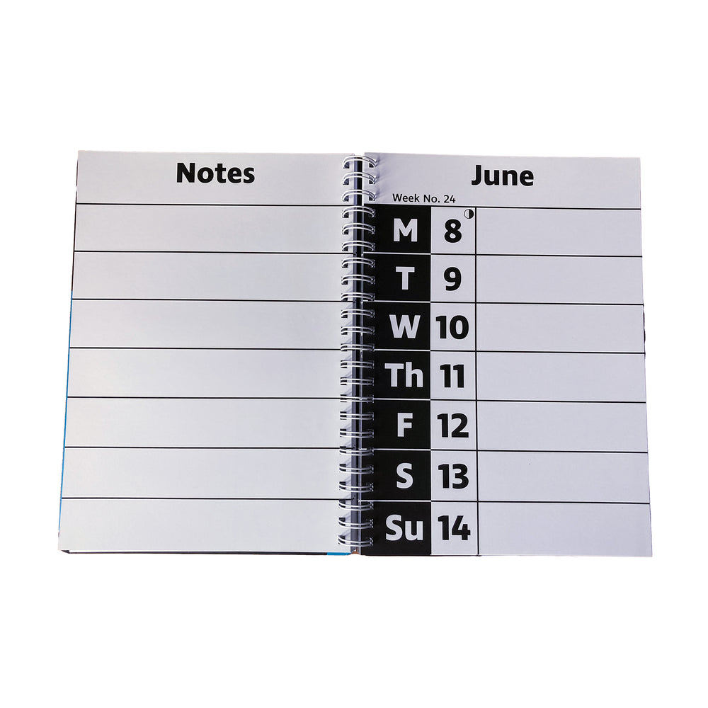 Open spiral-bound planner showing a weekly layout with notes section on the left and calendar grid on the right.