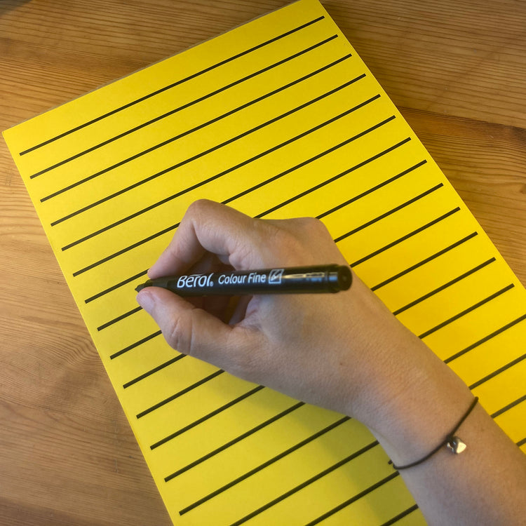 Alternative view of RNIB A4 yellow writing pad, lines 1.7cm apart