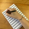 Someone writing in notepad