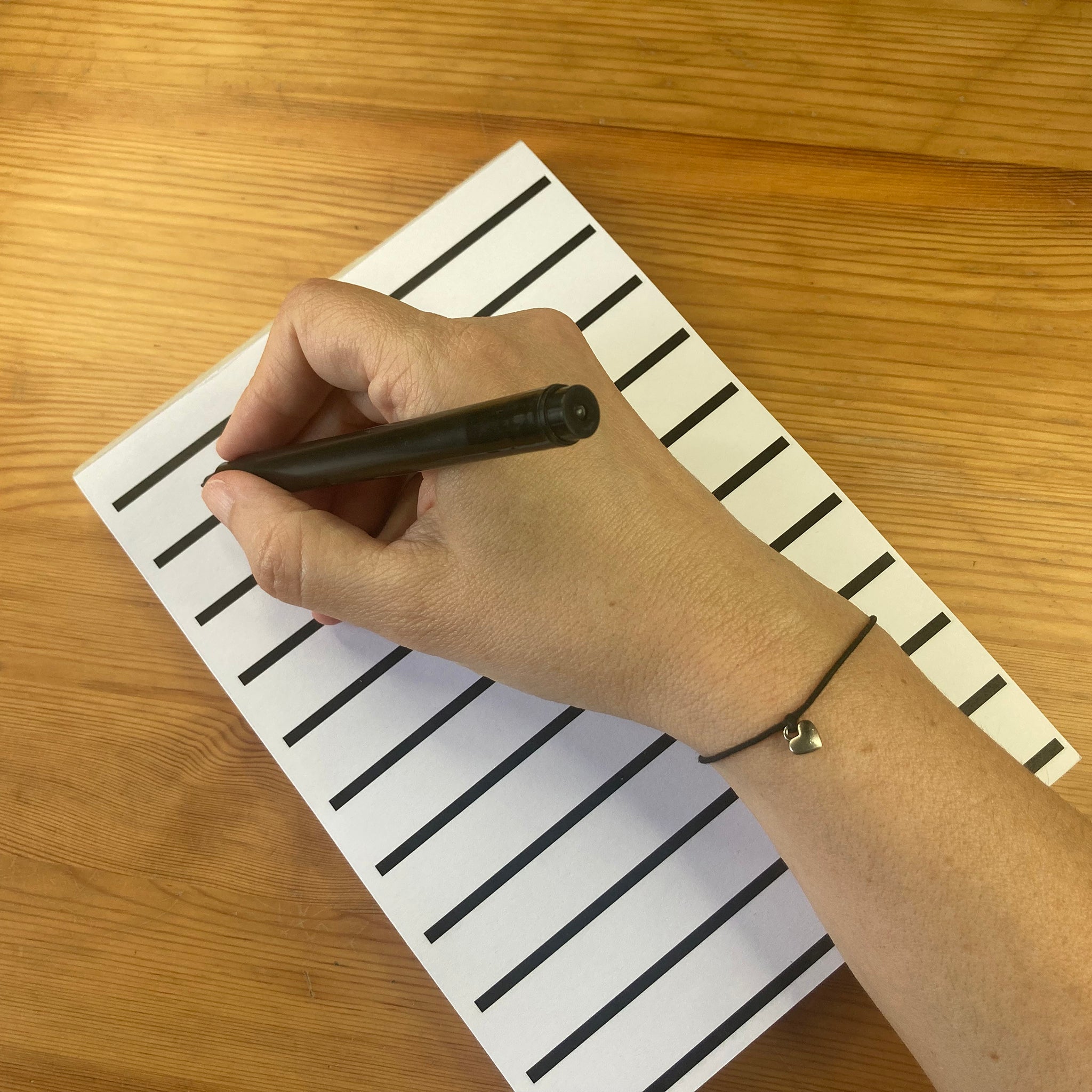 Someone writing in notepad