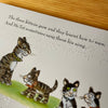 Close up of clear braille overlay and text and illustrations underneath