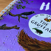 Children's book cover with a purple background.