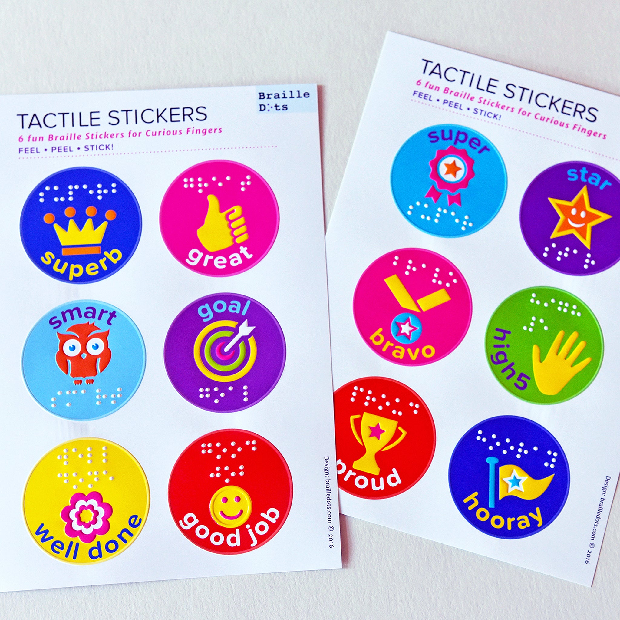 Two sheets of tactile reward stickers