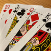 Close up of braille on fanned cards from 10 to King