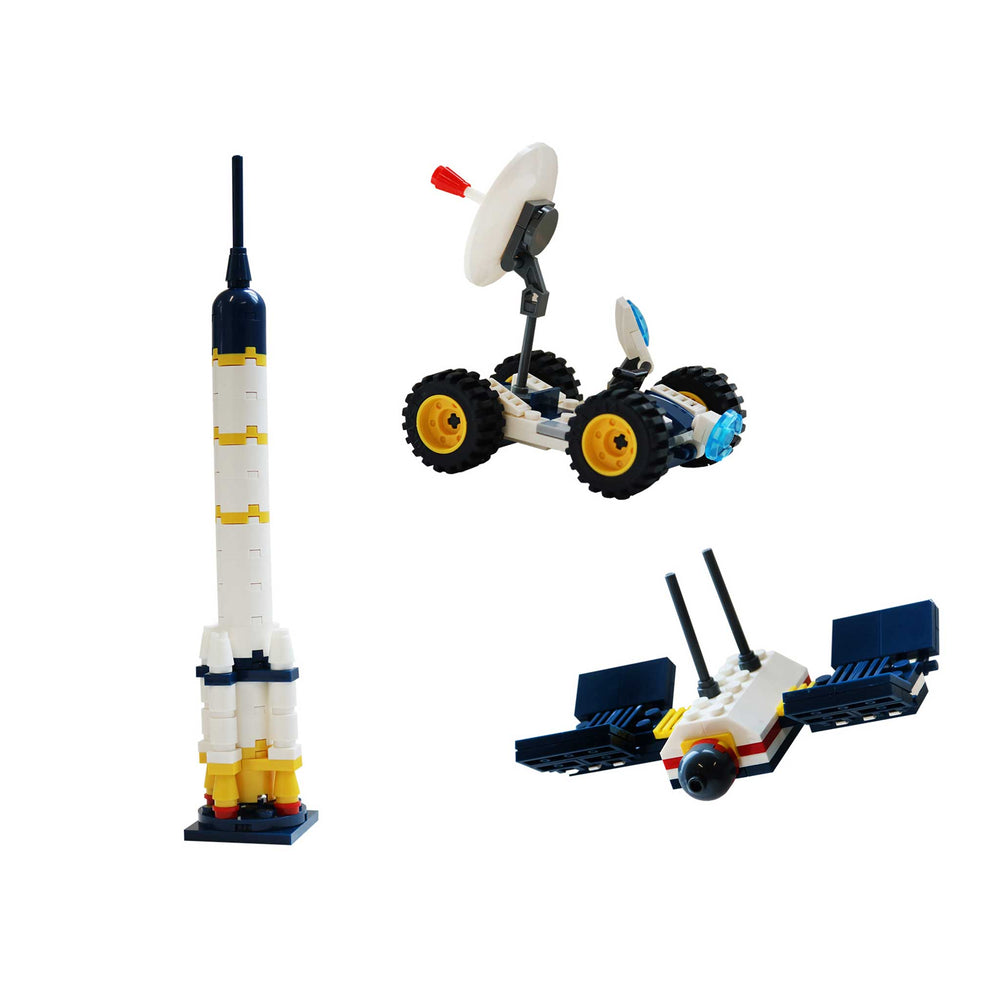 Three space-themed models made from interlocking bricks on a white background