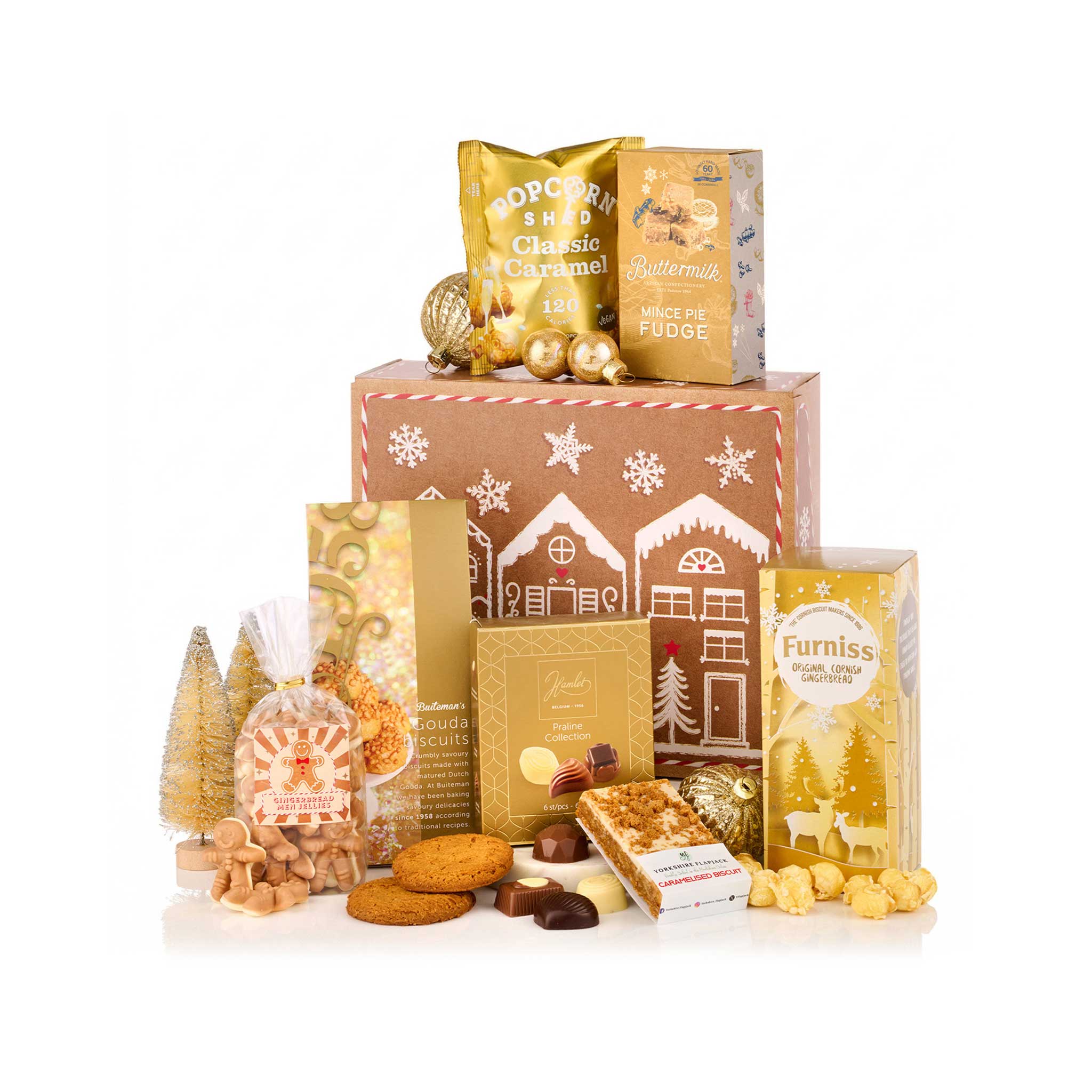 A Christmas-themed gourmet gift hamper featuring an assortment of festive treats, cookies, chocolates, and popcorn in coordinated gold, brown, and white packaging, arranged on a white background.