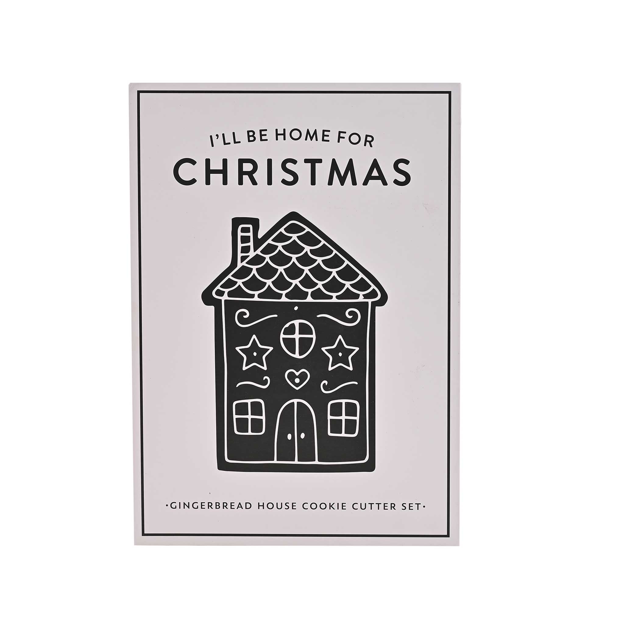 A gingerbread house cookie cutter set packaging card featuring a black line art illustration of a decorated gingerbread house with the text 'I'LL BE HOME FOR CHRISTMAS' and 'GINGERBREAD HOUSE COOKIE CUTTER SET' on a white background.