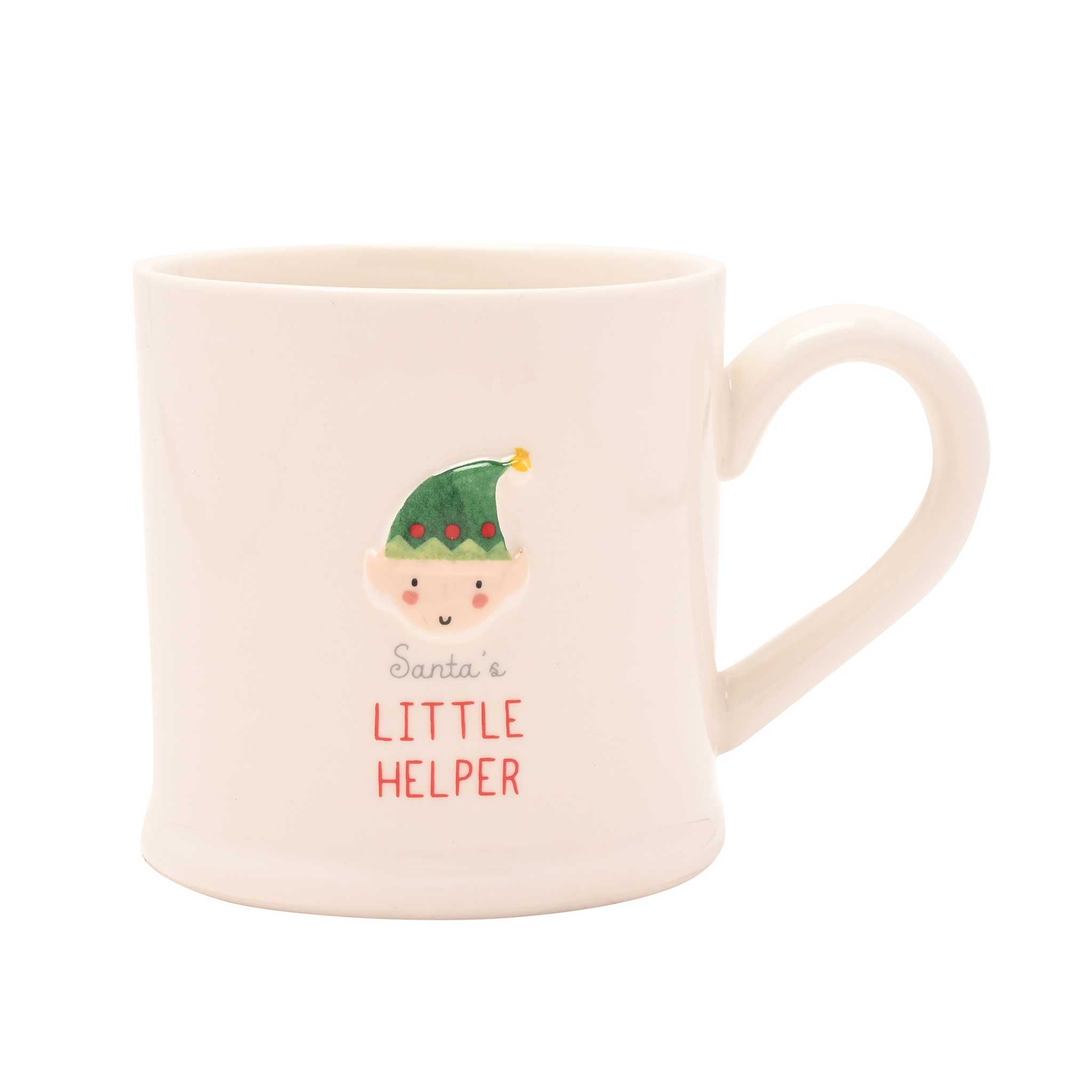 An off-white ceramic mug featuring a cute cartoon elf face wearing a green hat with red ornaments, above the text 'Santa's LITTLE HELPER' in red and gray lettering.