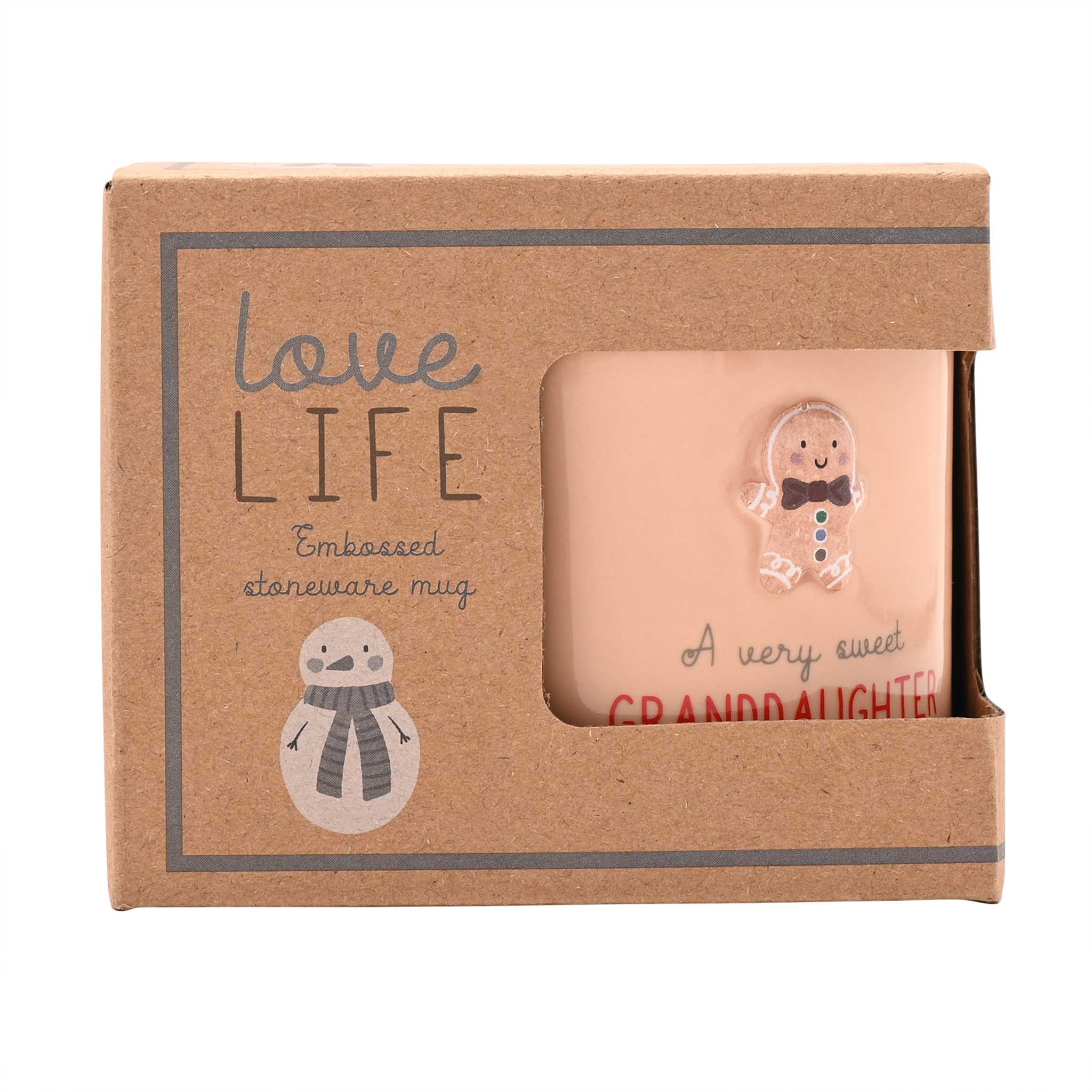 A peach-colored stoneware mug with a gingerbread man charm and 'A very sweet GRANDDAUGHTER' text, presented in its brown kraft paper gift box with a snowman illustration.