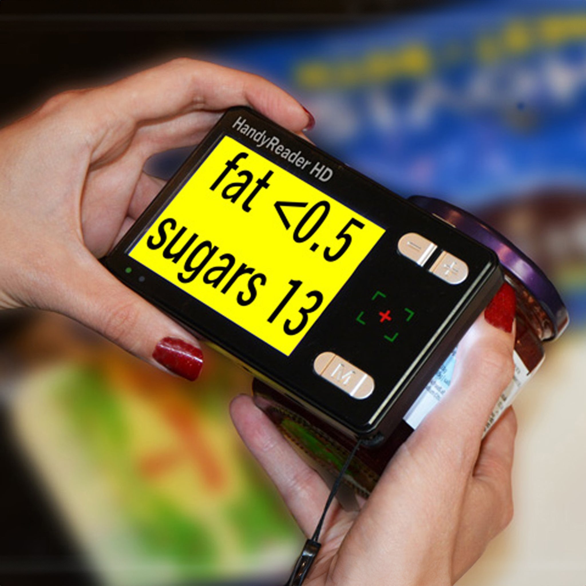 A HandyReader HD video magnifier showing enlarged nutritional information on a jar in the black on yellow format