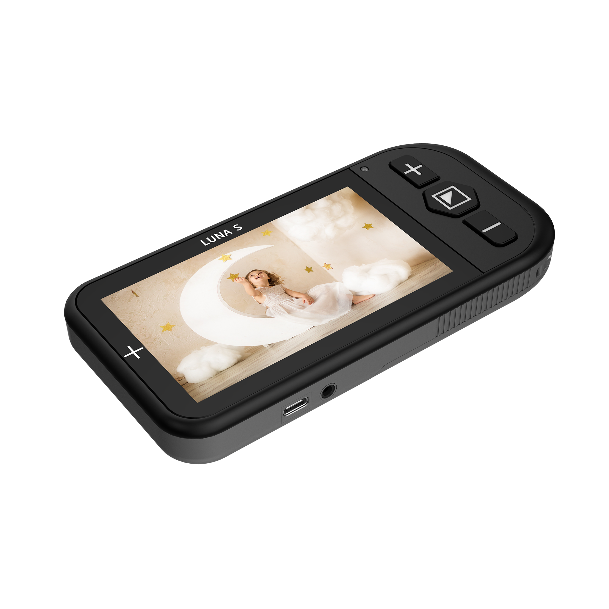 Angled view of Luna S portable video magnifier showing a photo of a child playing with a moon and stars in a photo studio
