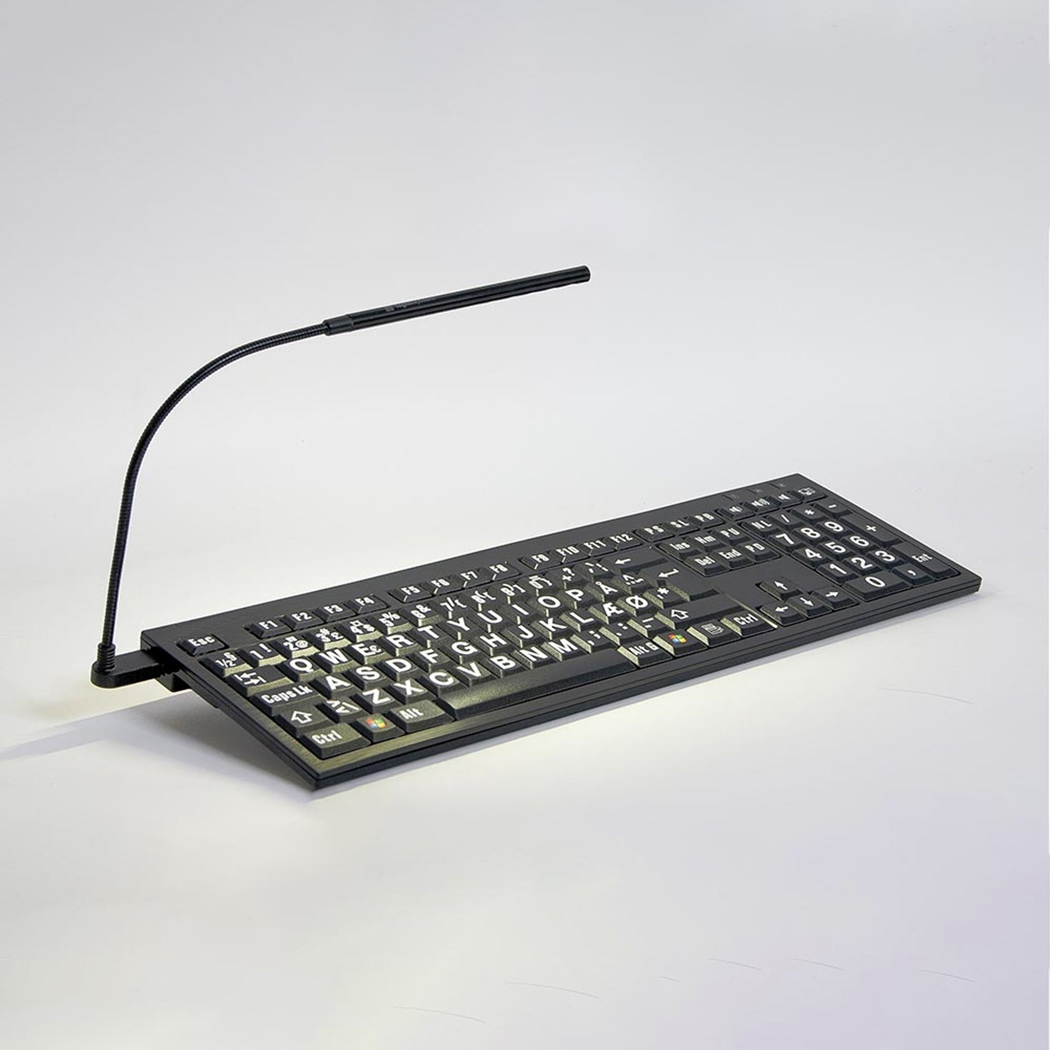 Keyboard (white text on black) with angled light turned on