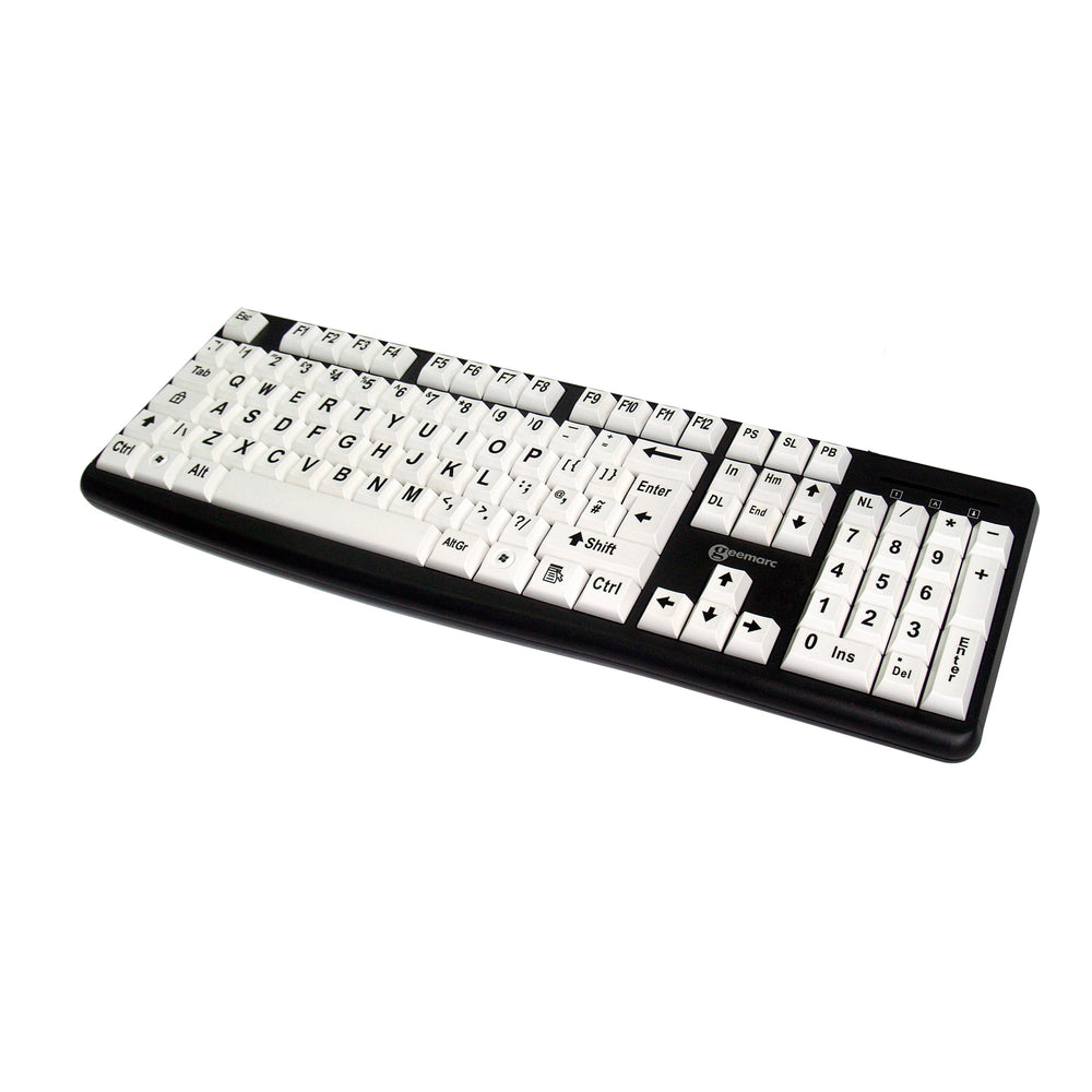 Keyboard with large black letters on white keys, angled to the right