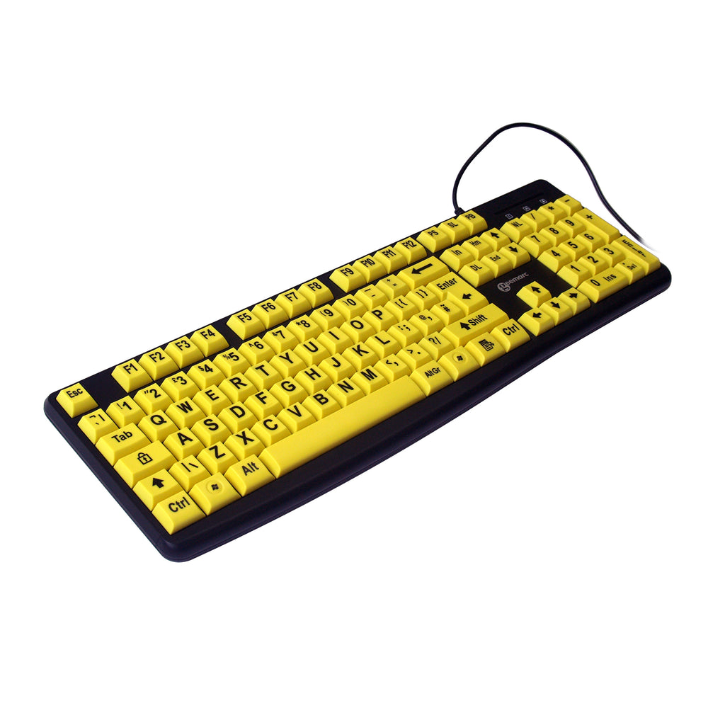 Keyboard with large black letters on yellow keys, angled to the left