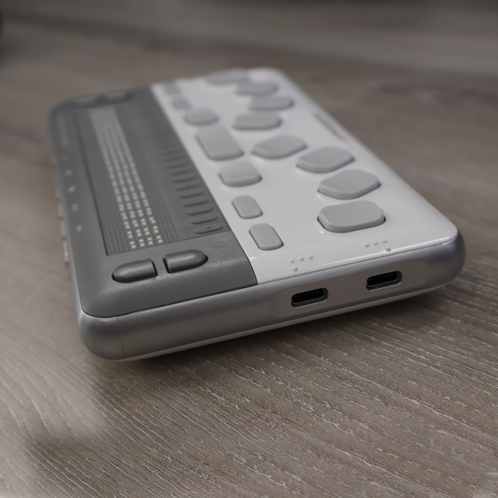 Close up view of the BrailleSense 6 mini's USB ports