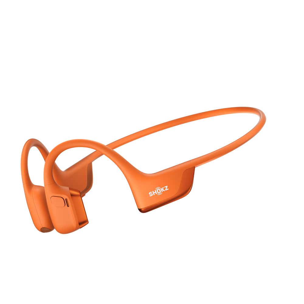 Side view of OpenRun PRO Shokz in orange.