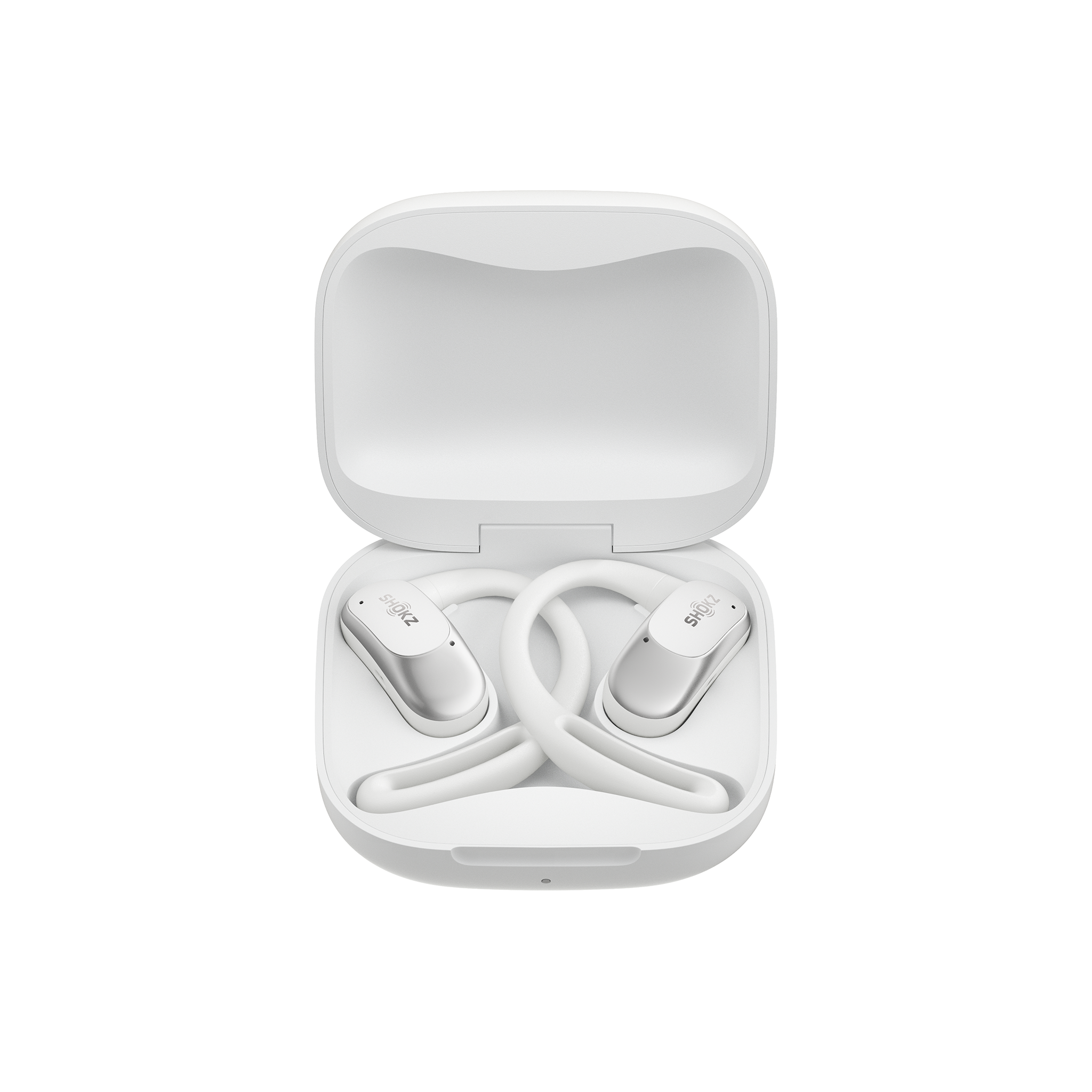 OpenFit AIR Shokz in white in a case against a white background.