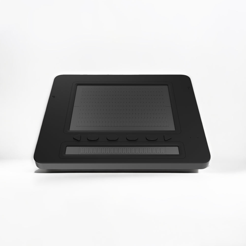 Dot pad X on a white background, angled to show the display and buttons