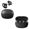 Black wireless earbuds shown with their open charging case on a white background. One earbud pair is floating above a closed case labeled SHOKZ, and another open case with earbuds sits below.